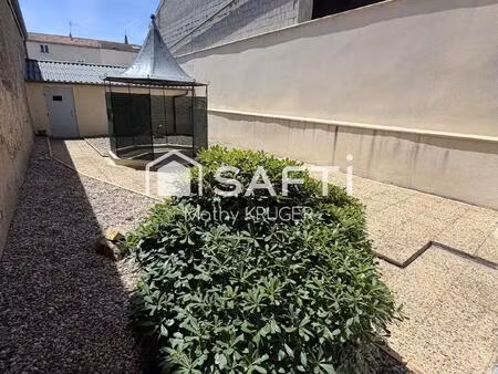 maison familiale avec 2 garages en centre-ville