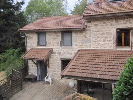 belle maison en pierre de 120 m² habitables  avec terrasse en lames de bois  grange à prox