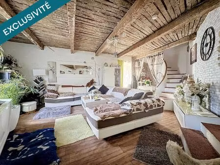une maison de caractère avec jardin et vue  alliant charme de l'ancien et confort moderne.