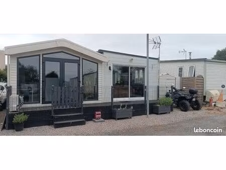 grand mobil home et extension dans camping à l'année