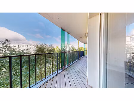 t3 - 60m2 - balcon - stationnement - dpe c - proche tramway