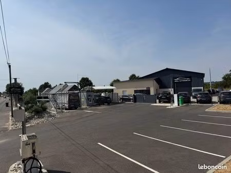 station de lavage + entrepôt / maison