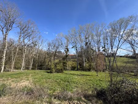 splendide terrain à bâtir de 1550 m2 dans un cadre naturel
