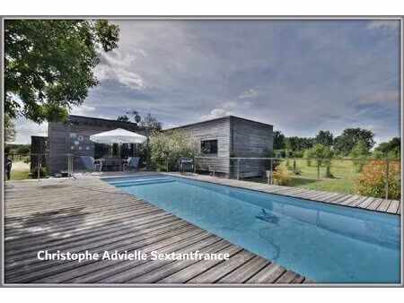 villa d'architecte ossature bois  plain pied   4 chambres   piscine  garage et atelier sur