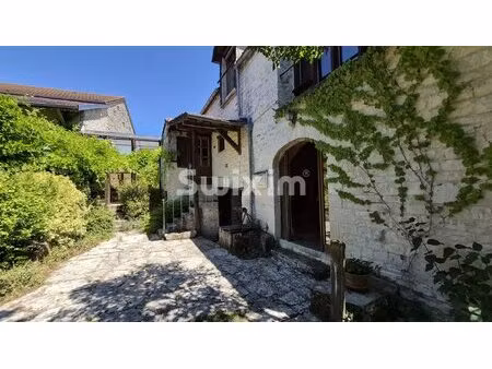 deux maisons de caractère réunies par une véranda de 60 m²