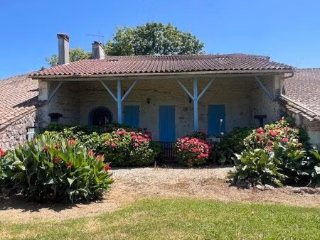 demeure en pierre avec dépendances et parc arboré