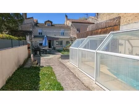superbe maison de ville avec jardin intime et piscine couverte