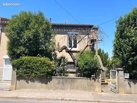 maison 3 chambres avec jardin et garage en sous sol