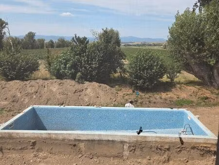 ensemble de 2 maisons avec terrain et piscine