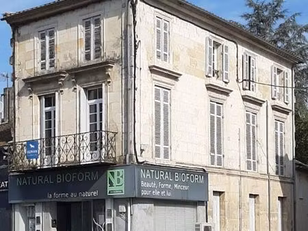 immeuble habitation + commerce à saisir