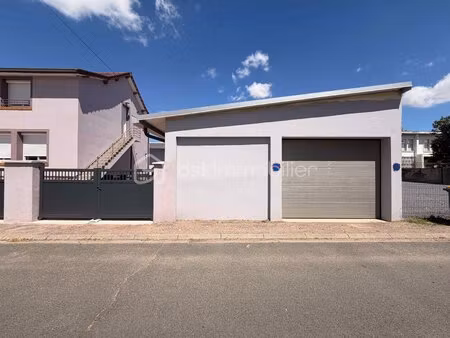 local de stockage de 118 m² à montceau-les-mines
