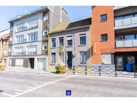 maison de caractère avec jardin et garage  en plein centre-
