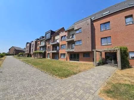 apt 2 ch de +/- 80m² avec balcon  cave et pkg int. !