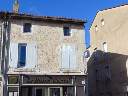 immeuble appartements + commerce