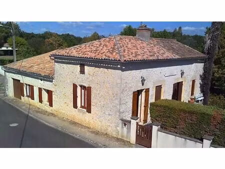 charmante maison en pierre avec 3 garages dans un beau parc arboré