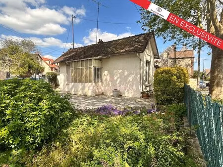 maison individuelle avec jardin et garage  à deux pas des transports en commun et des...