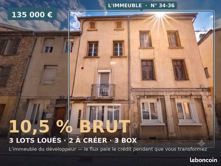 immeuble 3 lots loués + 2 à créer + 3 box · 135 000