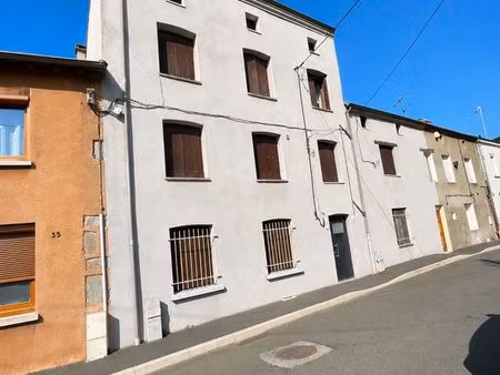 ensemble immobilier (maison + immeuble + terrain constructible + 3 garages…)