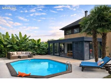 maison d'architecte unique avec piscine et étang privatif – cadre exceptionnel