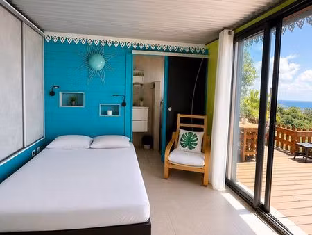 location studio meublé saint paul - piscine et vue mer