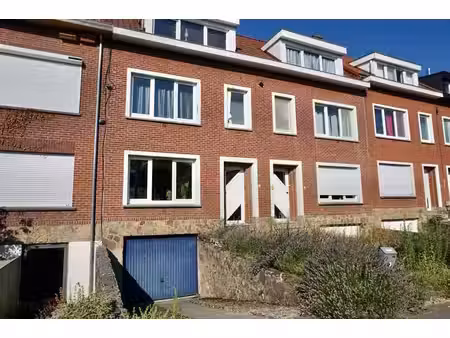 **charmante rijwoning met 4 slaapkamers en garage in kess...
