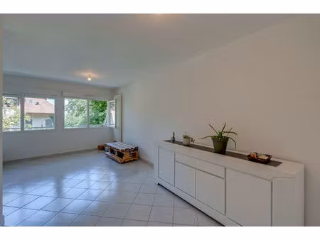 appartement 3 pièces 60.02 m² loi carrez avec cave et garage en centre ville d'evian-les-b