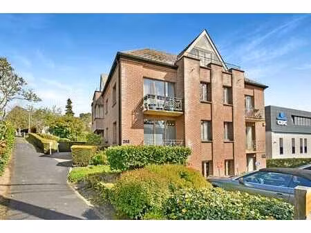 genval - appartement 75 m² 2 ch + terrasse + parking + cave