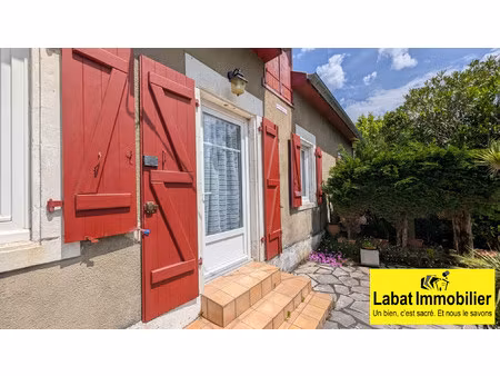 maison divisée en 2 logements