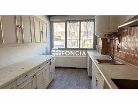 appartement t5 à rénover – fort potentiel à proximité du centre-ville