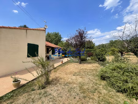 maison 4 faces de plain pied avec jardin et garage
