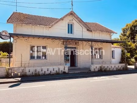 bâtiment à usage de commerce bar/ resto/autres + habitation