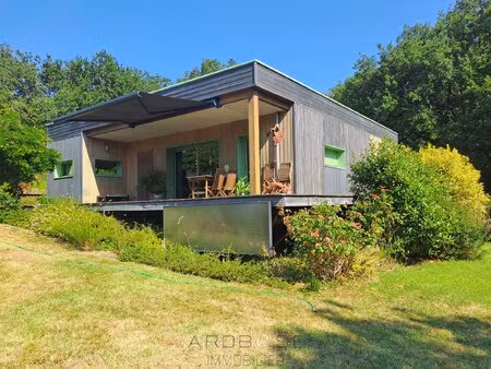 maison bioclimatique à ossature bois  piscine biologique  gîte indépendant et panneaux...