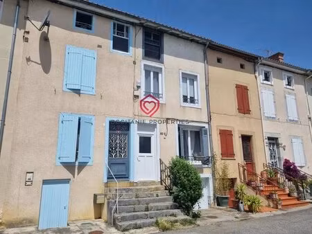 petit maison de ville compacte joliment rénovée avec cuisine d'été.