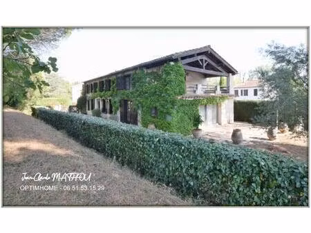 en bordure du canal du midi – belle demeure familiale avec jardin et double garage – caste