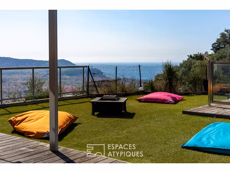 appartement rez- de- jardin surélevé vue mer et couloir de nage à nice