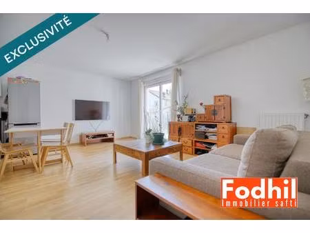 appartement 2 pièces de 50 m² et parking.