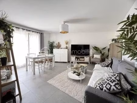 appartement 3 chambres - balcon - place de stationnement