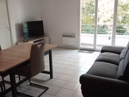 appartement - t2 bis - 55m2 - avec balcon et parking