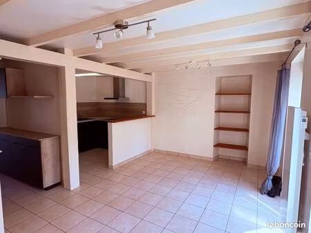 appartement en rez-de-jardin  au coeur du bourg