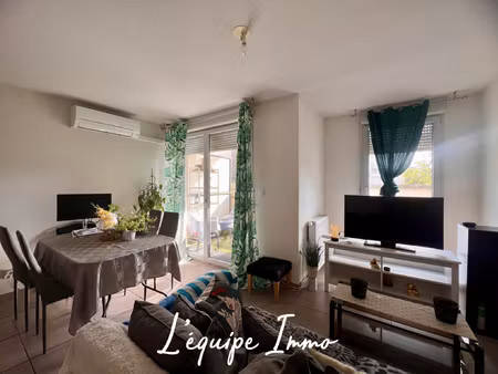 t2 rdc avec balcon et double parking en sous-sol