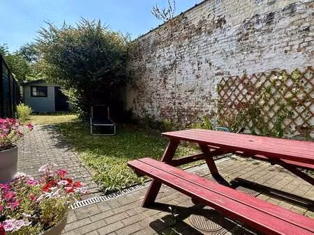 gezellig gelijkvloers 1-slaapkamerappartement met tuin in...