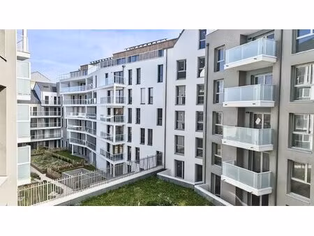 t3 neuf traversant double balcon