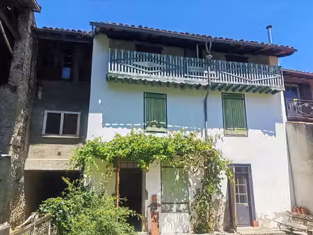 maison de village spacieuse avec grand jardin et potentiel d'aménagement