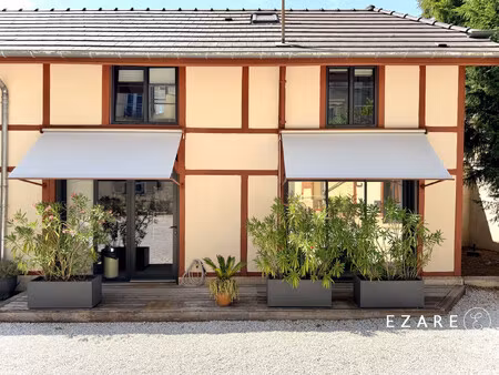 appartement/maison avec terraiin et stationnement privatif