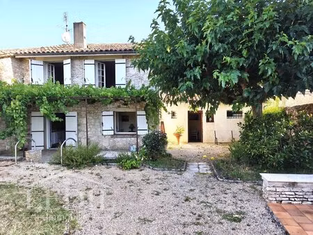 maison de bourg avec 4 chambres  garage  jardin clôturé et potentiel