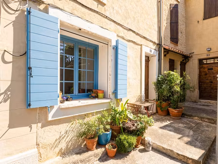maison de 115m2 avec garage  terrasse et cave.