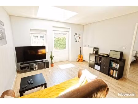 app. t2 avec terrasse privative + cave à 10 min plaine de l'ain / pipa et cnpe bugey