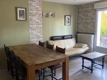 appartement lumineux de 64 m² avec balcon et cave