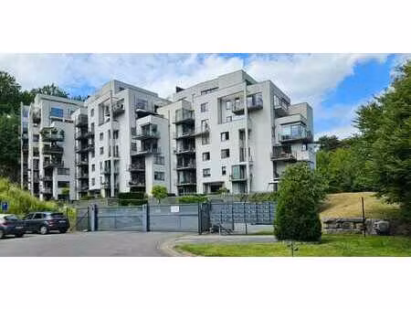appartement 2 chambres avec jardin + cave + parking ext.