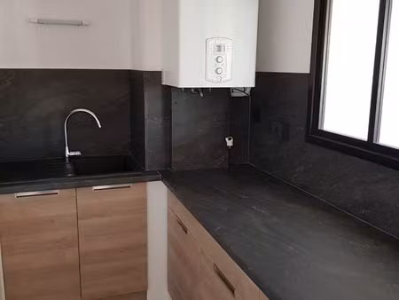 mini f2 36m² avec place de parking